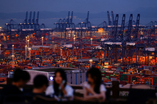 Wary investors hope US-China talks cool high-stakes trade war