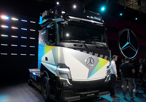 Daimler cuts full-year operating profit forecast